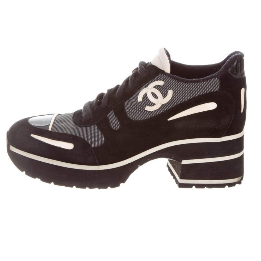 Black suede Chanel sneakers